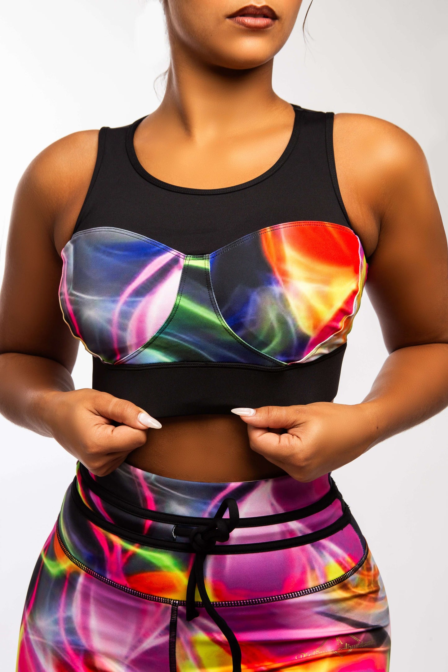 Colorful Neon Nirvana Empress Fit Bra paired with vibrant legging, showcasing bold activewear design and comfortable fit.